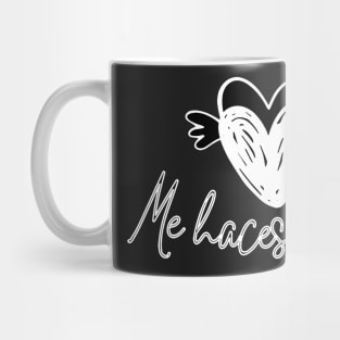 Motivational and romantic phrase in Spanish: You make me fly with two winged hearts. Mug